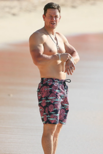 Mark Wahlberg at beach wearing Not For Fun necklace